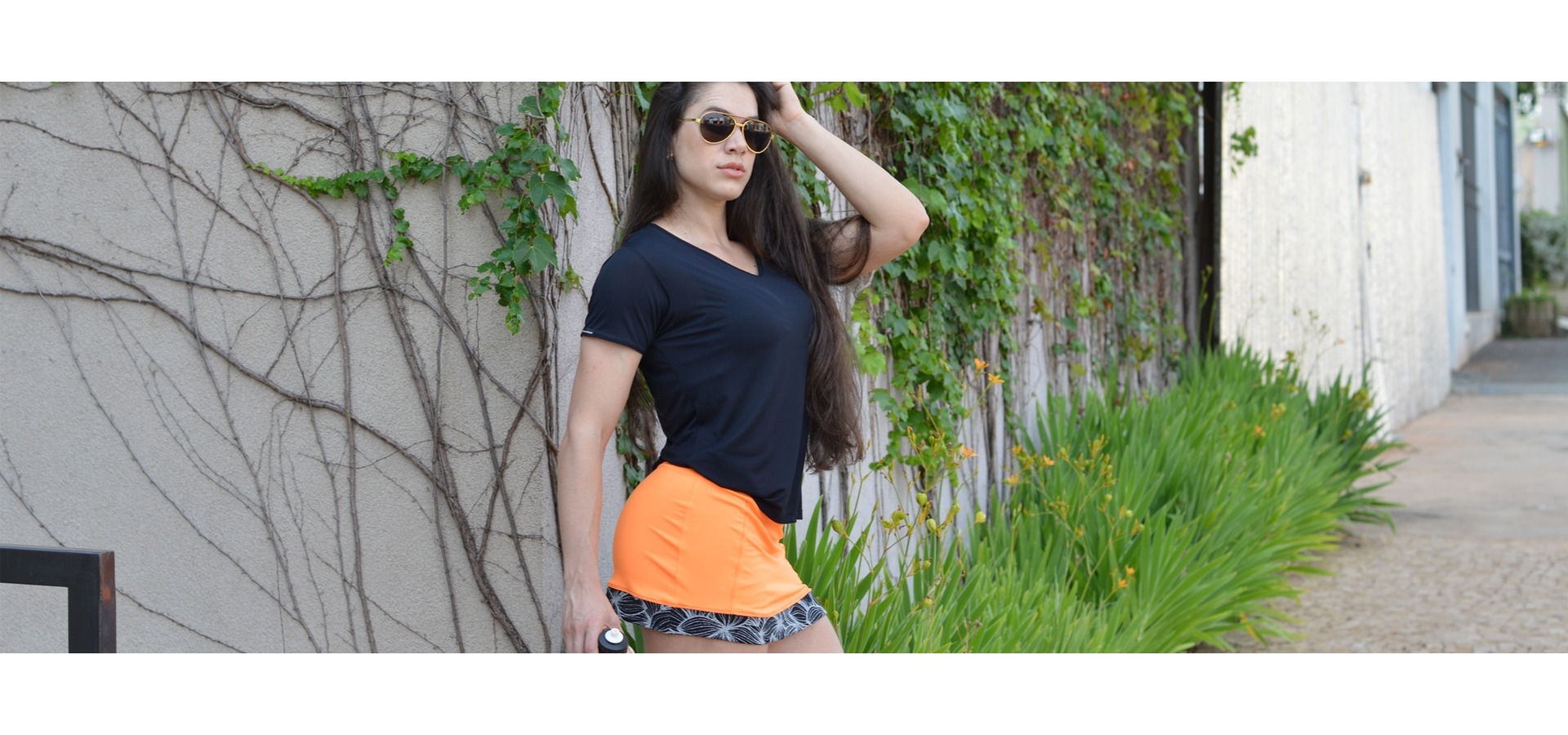 Saia short fitness com detalhe floral-Laranja